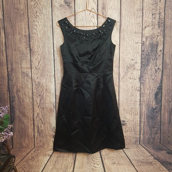 LOFT Dresses & Skirts - Ann Taylor Loft black embeselled dress size 6